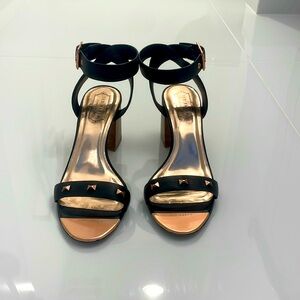 Ted Baker Baih Open Toe studded block heal in black with rose gold bows.